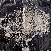 1982<br>pittura industriale, coriandoli su tela, cellophane<br>cm 60x60